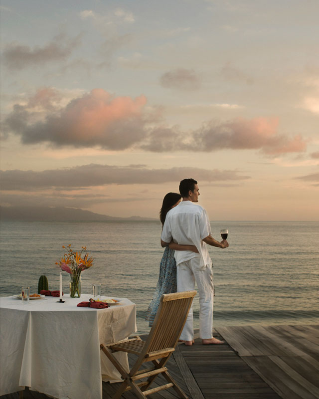 Couple Dining Overlooking the Ocean