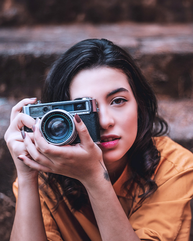 Woman holding a camera