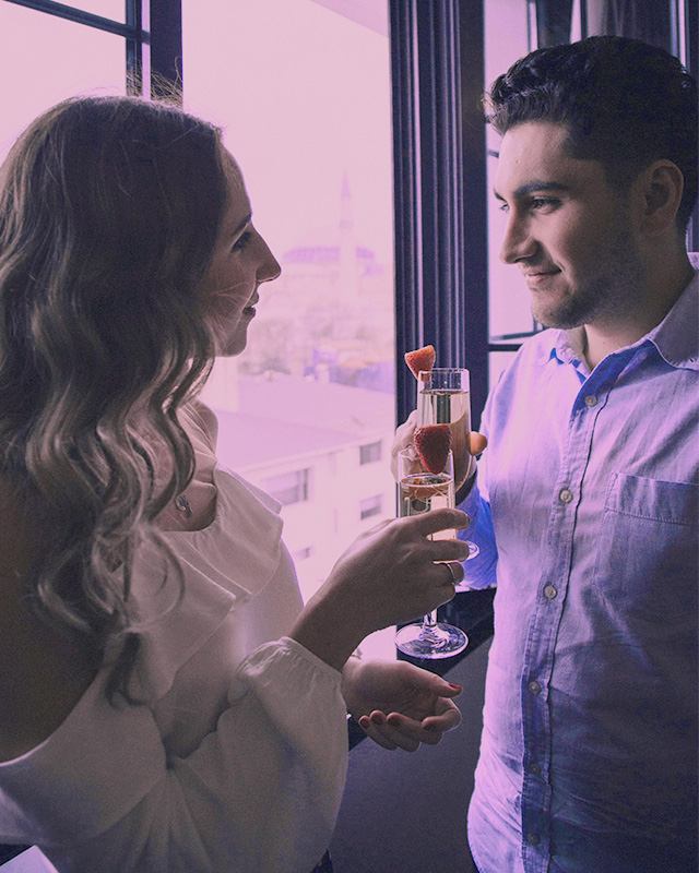 Couple drinking cocktails on a first date