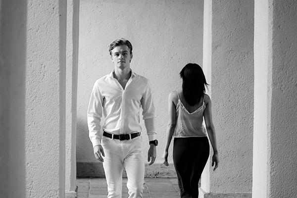 Couple passing each other