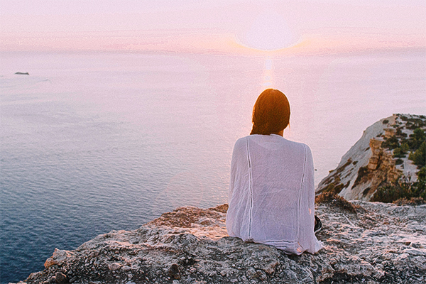 Woman watching the sunset
